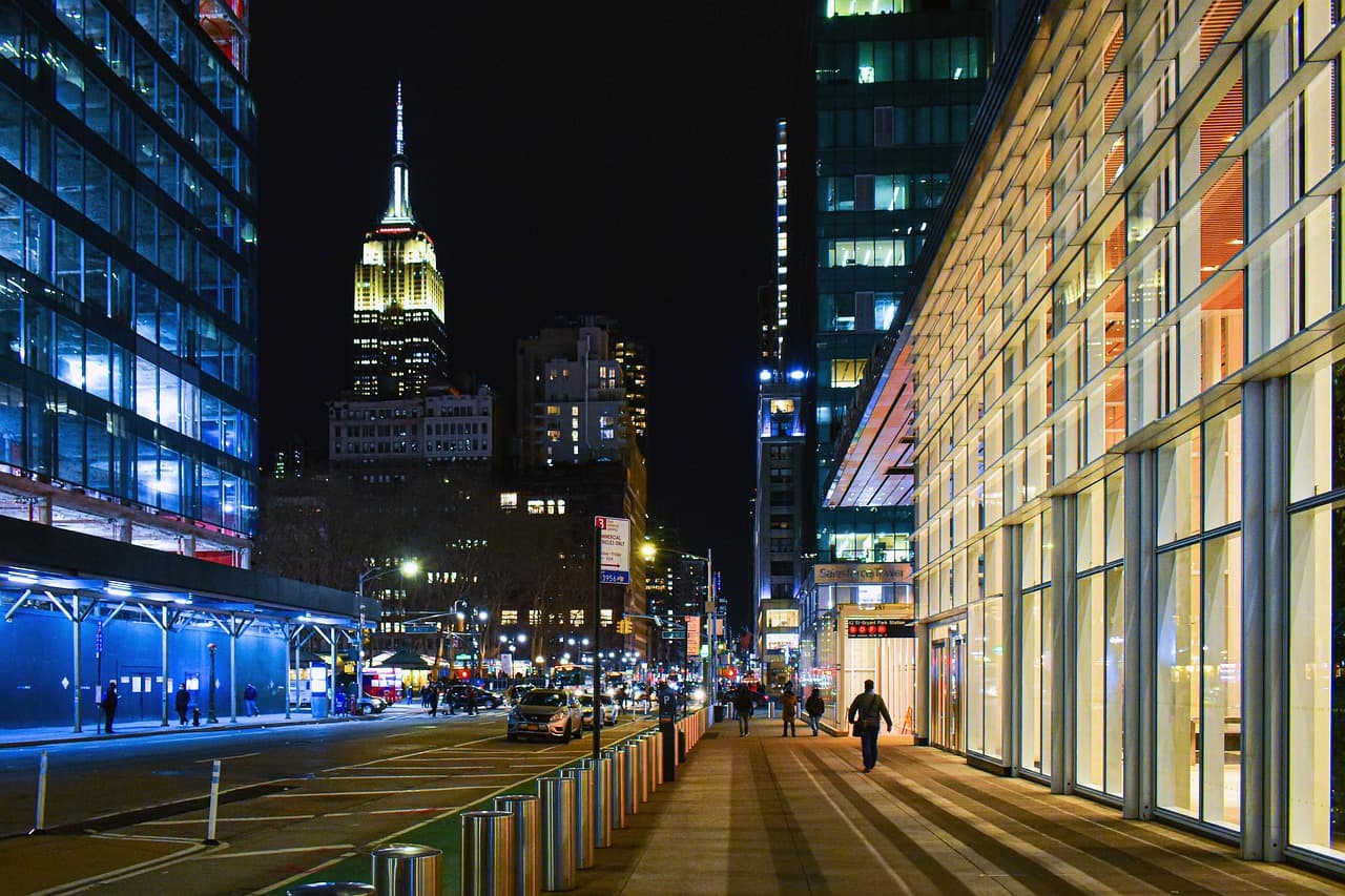 City office buildings at night, illustrating the Airwallex OpenTable payments partnership