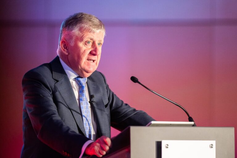 AI is unlikely to lead to major reductions in Jersey’s financial industry. Joe moynihan speaking scaled.jpg