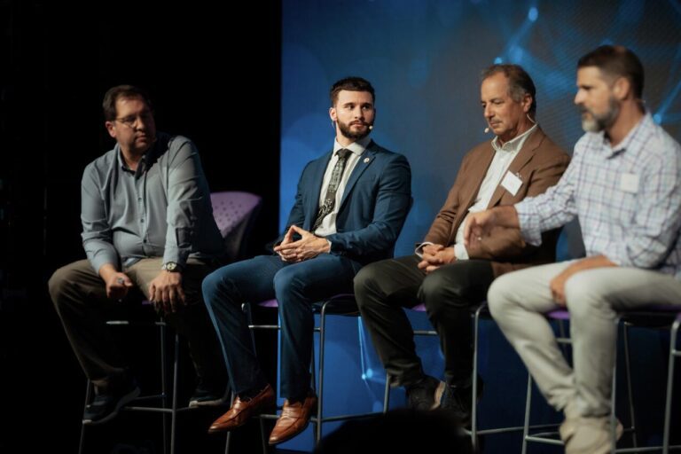 Matthew Schneider discussing stablecoins and cross-border payments at a blockchain conference